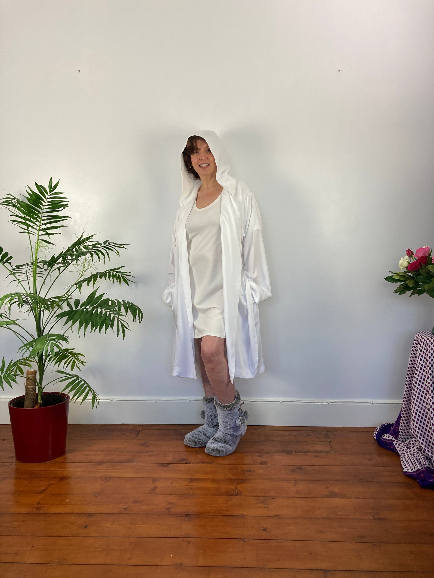 woman wearing hood up in organic sleepwear womens that help with hot flushes