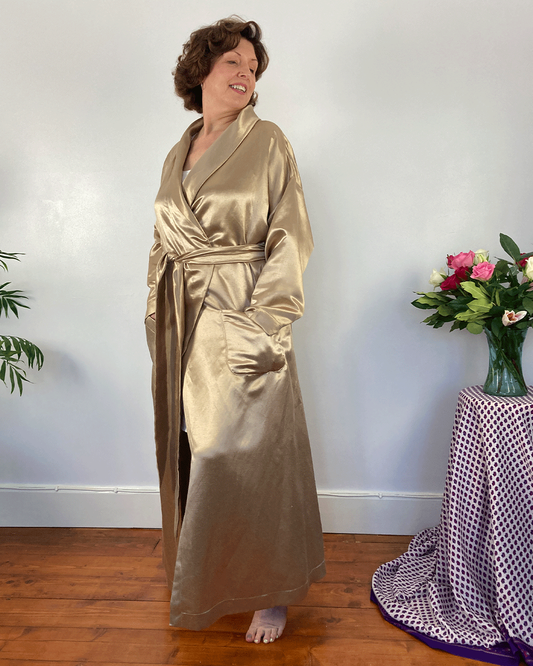 Women in long length golden wrap - helps with ways to reduce hot flashes to reduce hormones for menopause